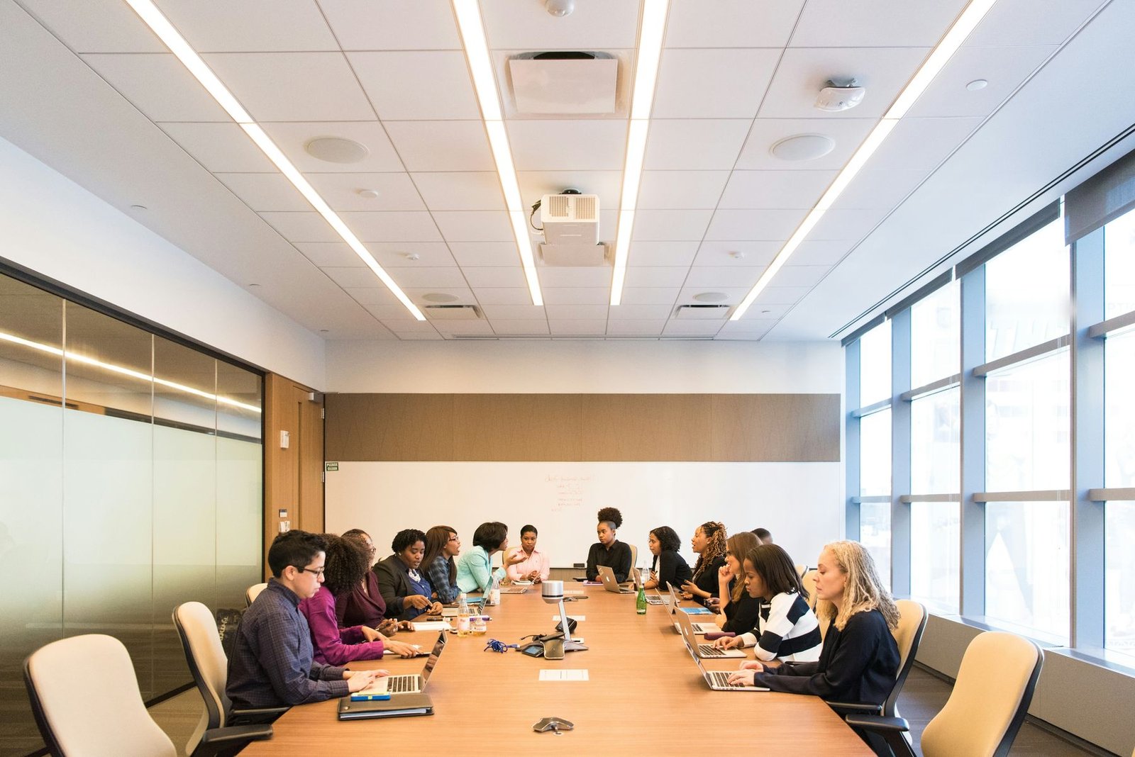 Senior leaders around a boardroom table
