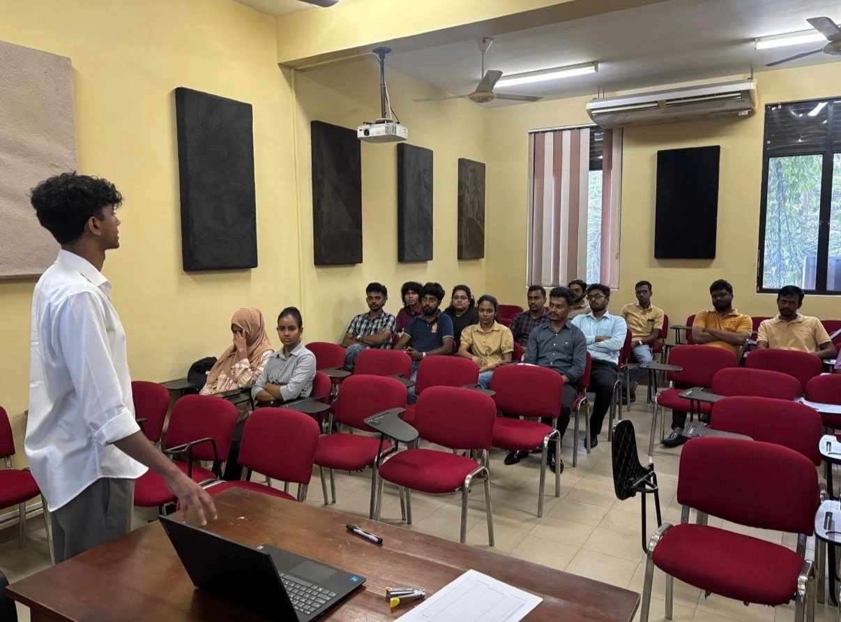 Dineth Ratnayake leading a Codax workshop with university students